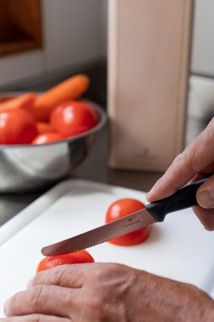 VICTORINOX 11CM SERRATED TOMATO KNIFE BLACK Woodbridge Kitchen Company